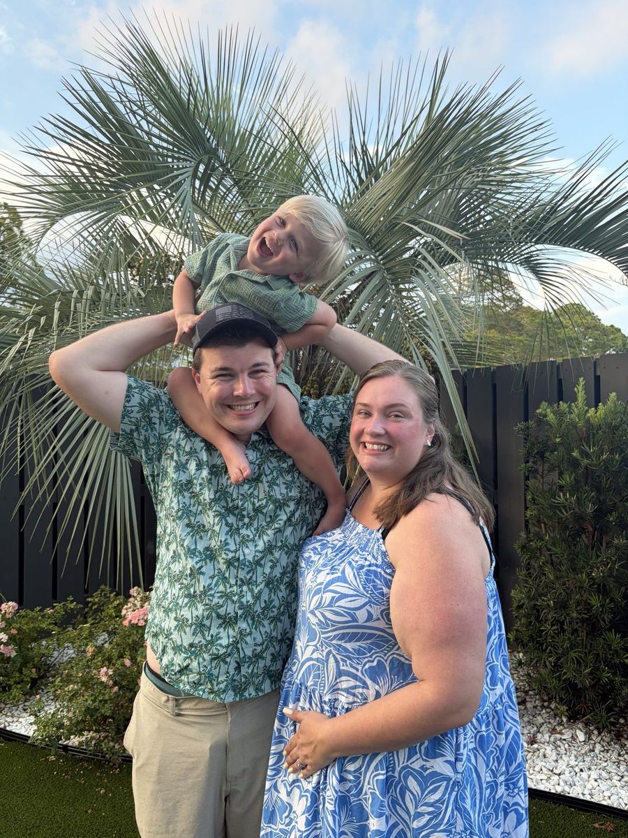 Ryan NeGron with his wife and son